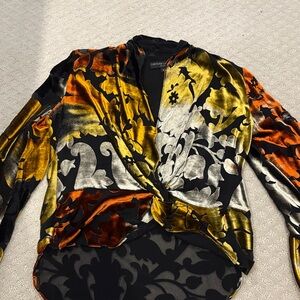 Caroline constas Velvet Floral Blouse in Black, Gold, and Orange high low hem